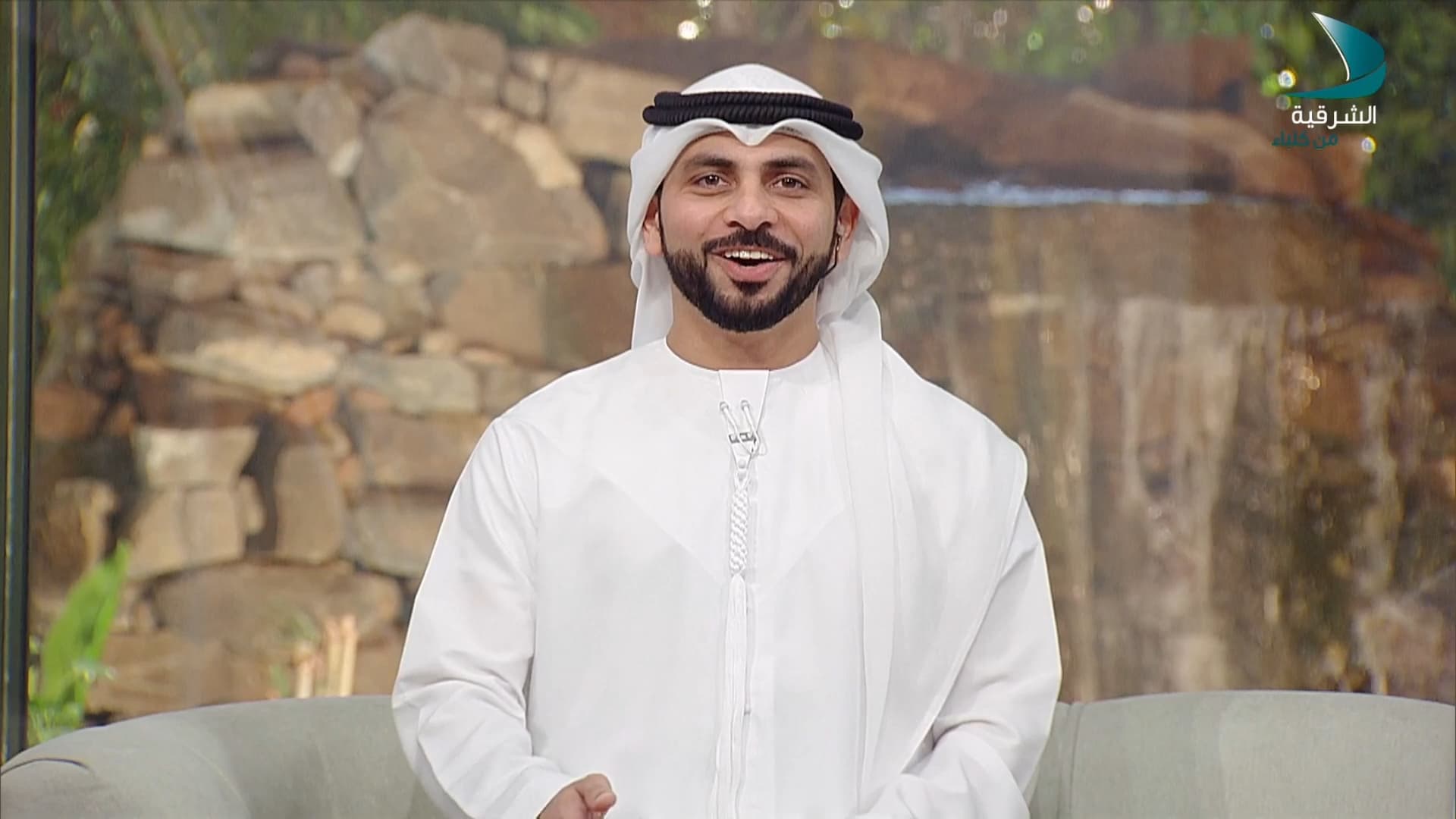 An image of the interviewer at Al Sharqiya Kalba TV.